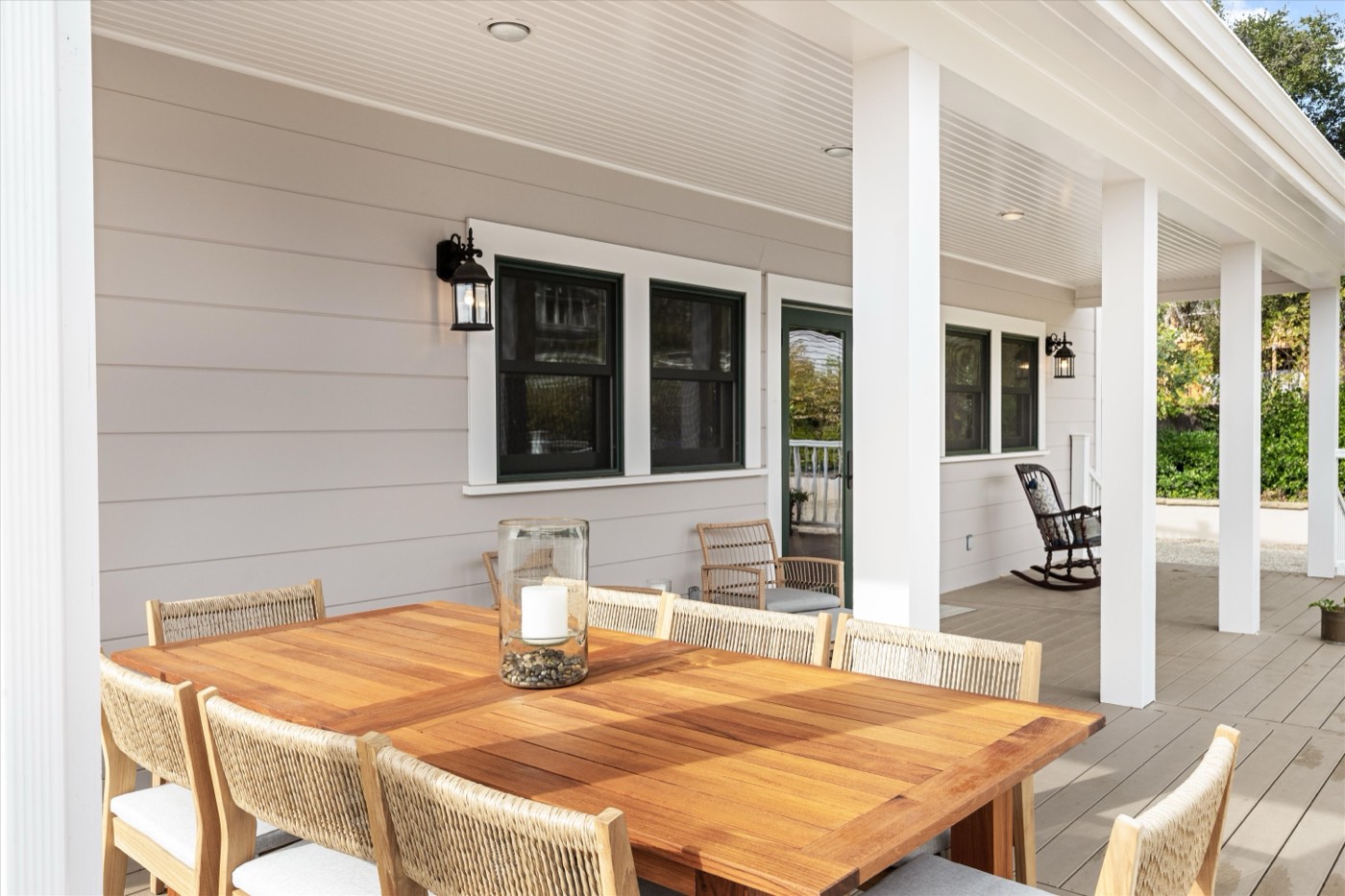 Covered porch with outdoor dining table